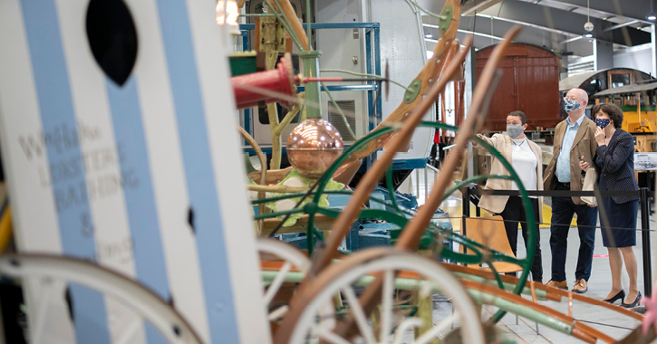 Visitors looking at an exhibition inside Locomotion Museum